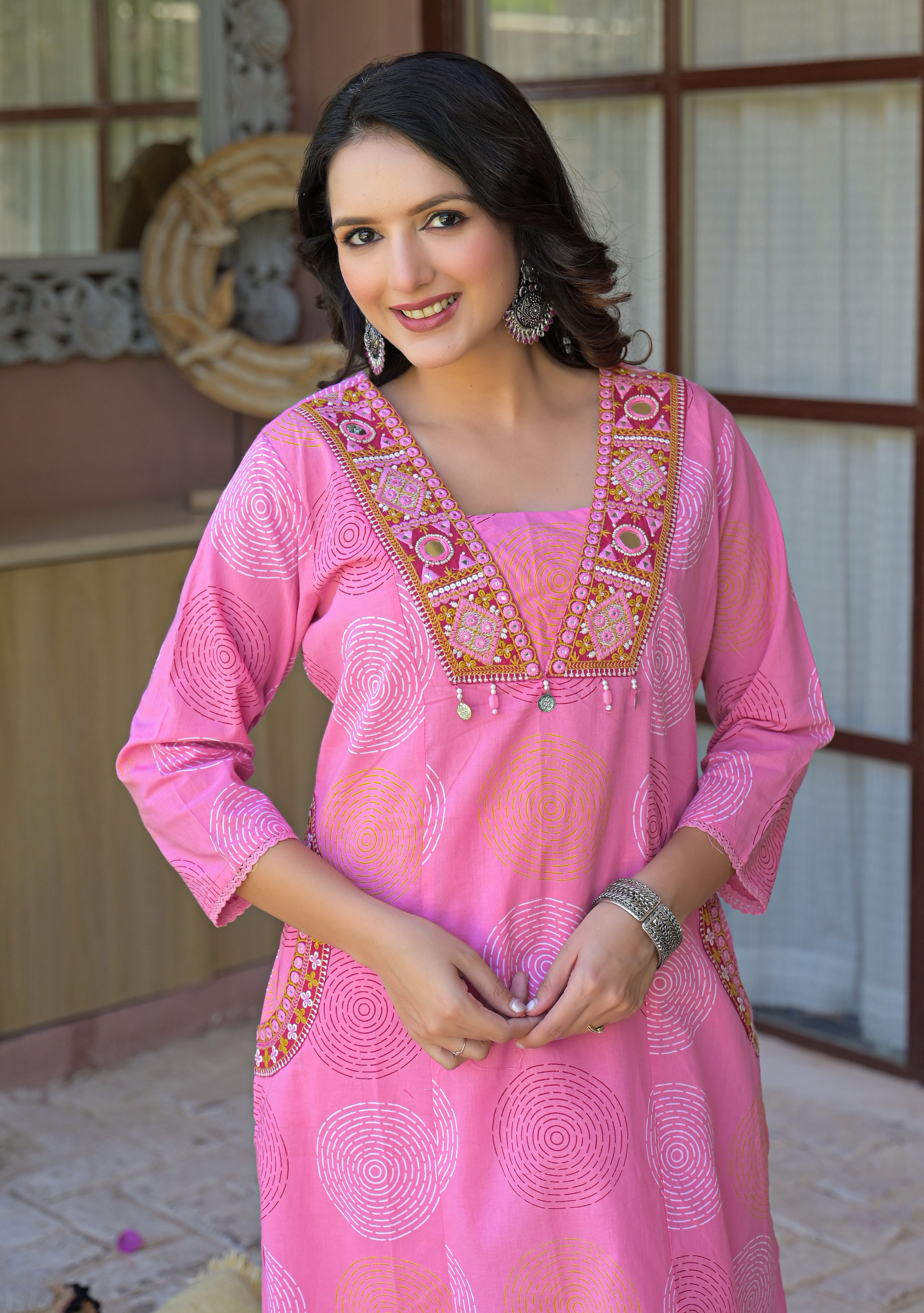 Pink A-Line Kurta Set with Embroidered Mirror Work Neckline & Embroidered Pockets